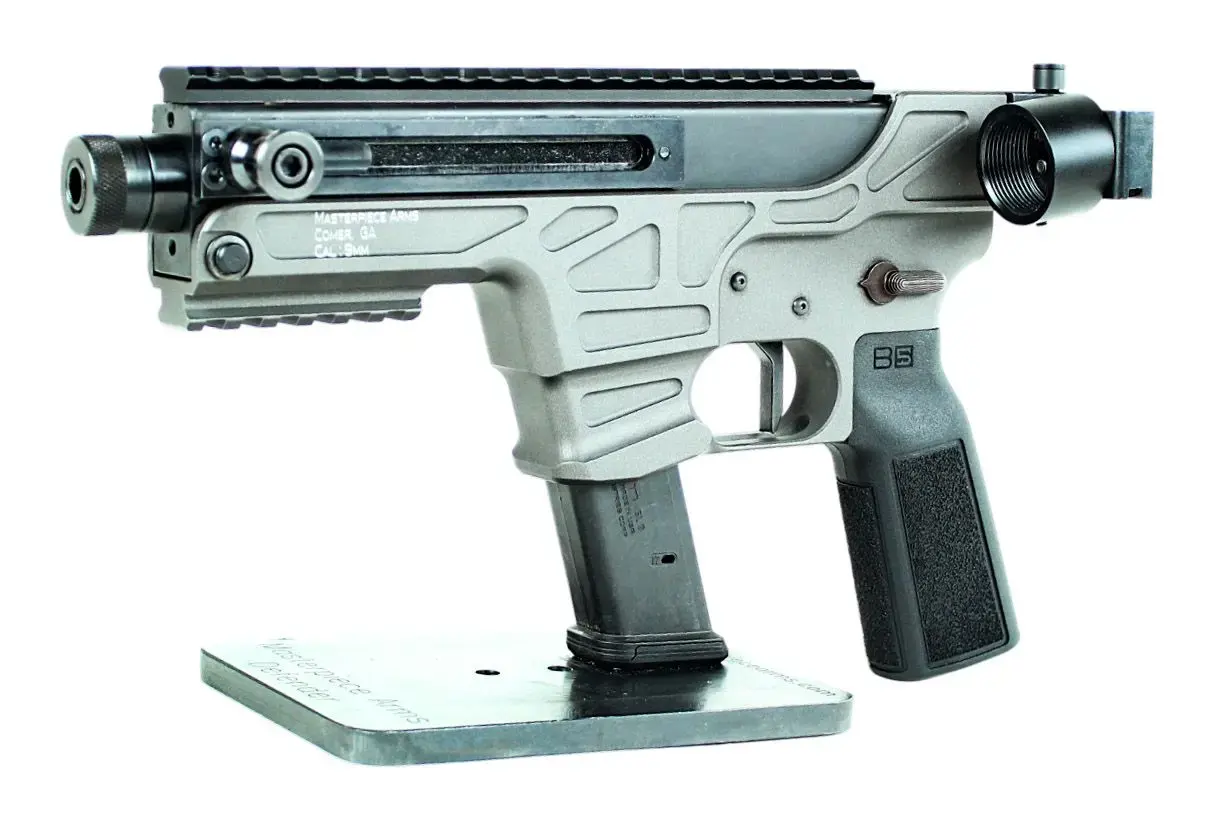 MASTERPIECE ARMS DEFENDER 30K 9MM PISTOL 4.5" T.B. SIDE COCKER, A2 GRIP, SIDE FOLD ASSEMBLY 1-34RD